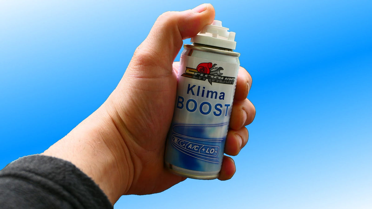 Schrauba Klima BOOST, Dose in der Hand mit Ein-Klick-Entleerungssystem